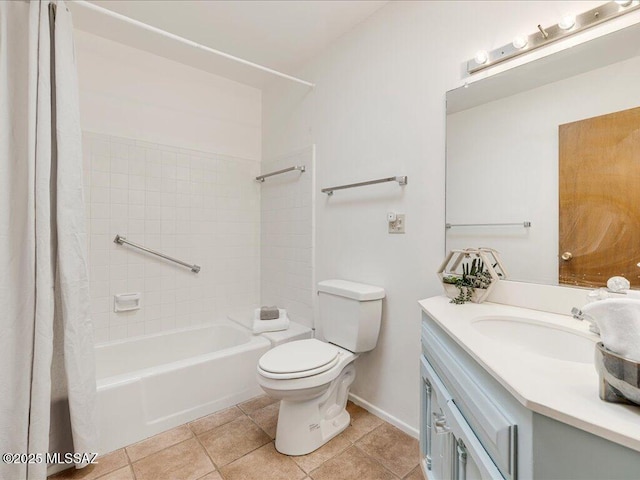 full bathroom with toilet, vanity, tile patterned floors, and tiled shower / bath combo