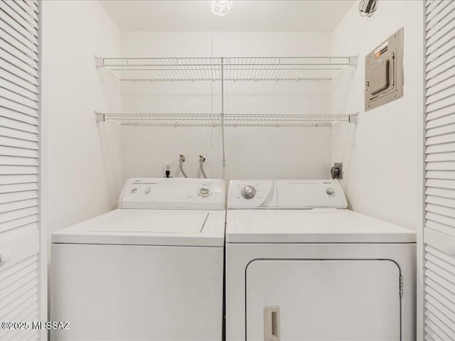 laundry area with separate washer and dryer