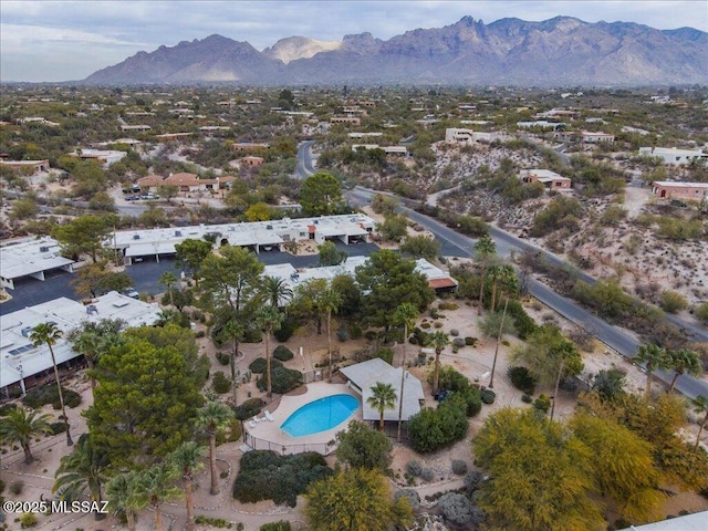 birds eye view of property featuring a mountain view