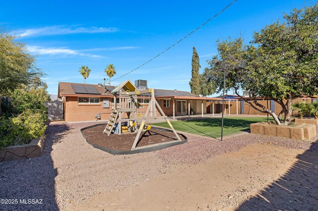 view of play area with a yard