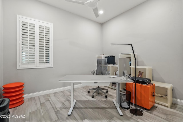 office area with ceiling fan