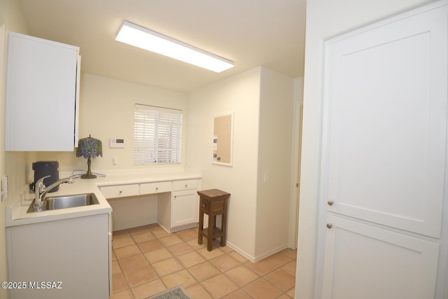 bathroom featuring tile patterned floors and sink