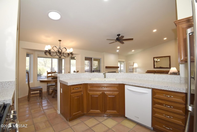 kitchen featuring ceiling fan with notable chandelier, electric stove, sink, light stone countertops, and light tile patterned floors