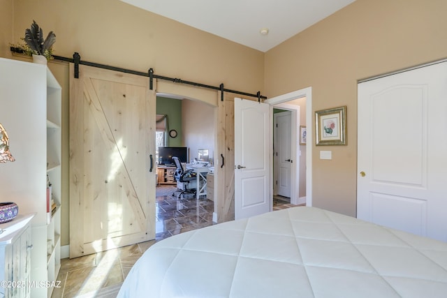 bedroom with a barn door