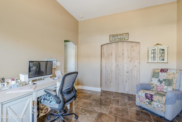 office area with lofted ceiling