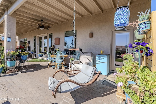 view of patio with ceiling fan