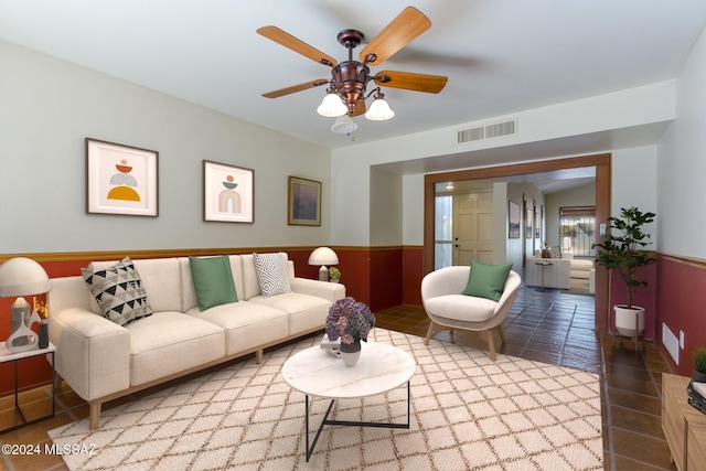 living room featuring ceiling fan