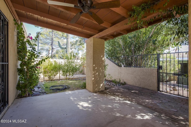 view of patio featuring ceiling fan