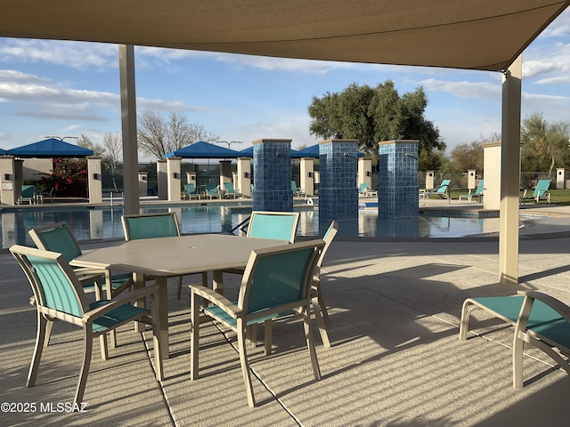 view of patio featuring a community pool