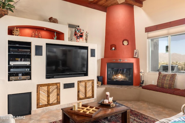 tiled living room with built in shelves and wood ceiling