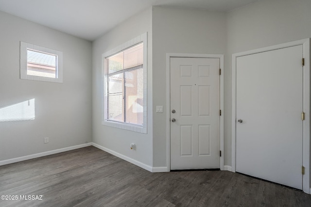 foyer entrance with hardwood / wood-style floors