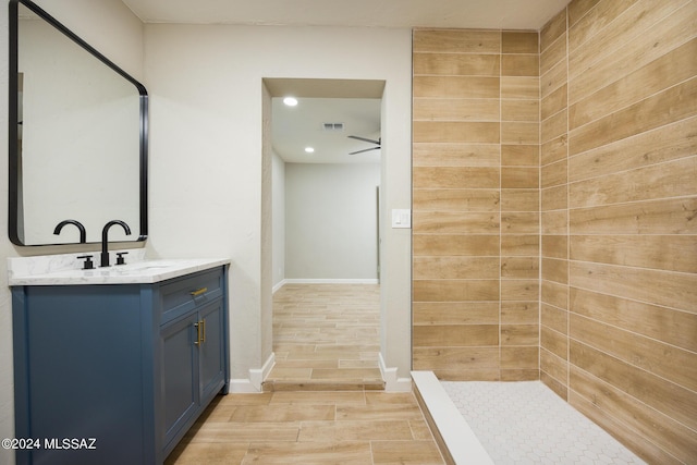 bathroom with vanity and ceiling fan