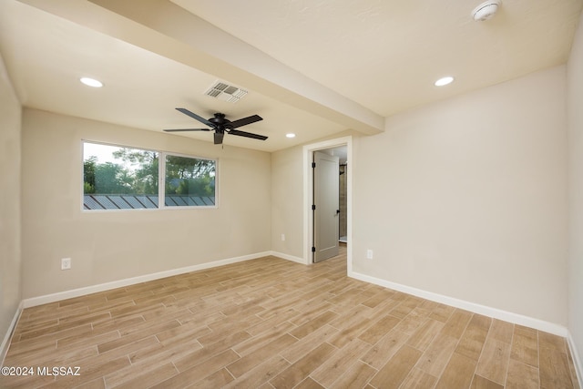 unfurnished room with ceiling fan