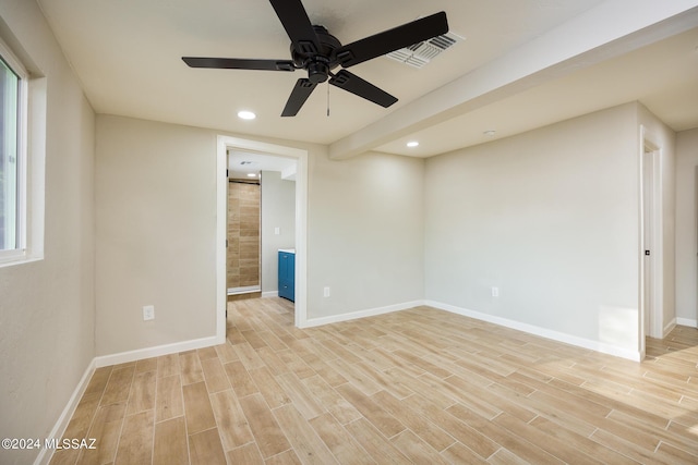 unfurnished room with ceiling fan