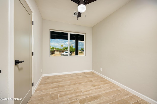 spare room featuring ceiling fan