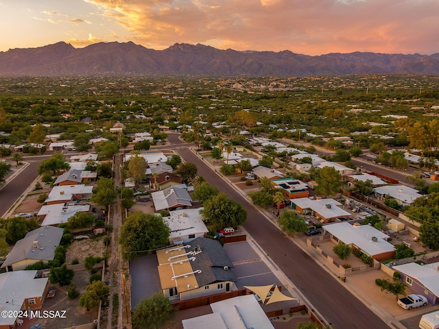 aerial view at dusk with a mountain view