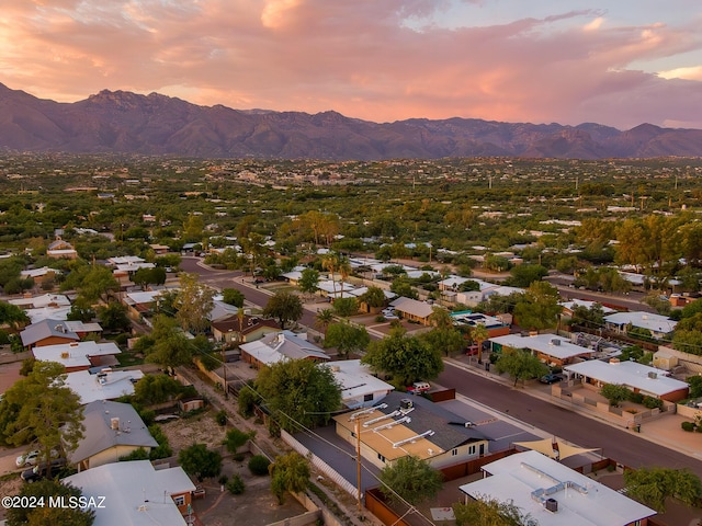 aerial view at dusk with a mountain view