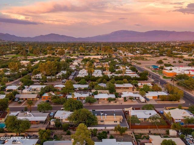 aerial view at dusk with a mountain view