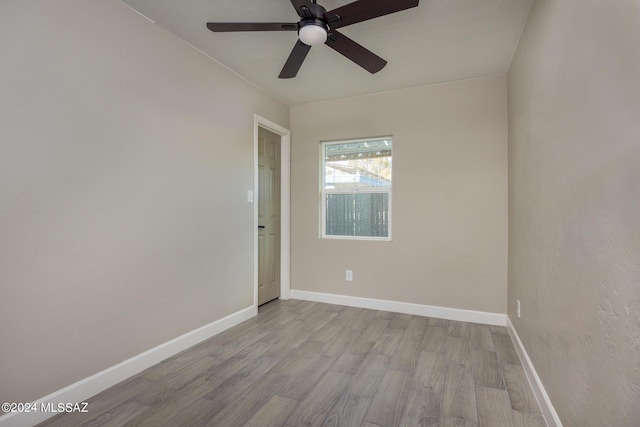 unfurnished room with light hardwood / wood-style floors and ceiling fan