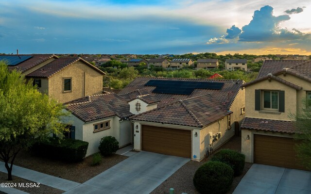 birds eye view of property featuring a mountain view