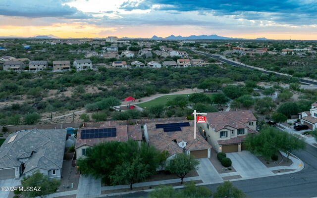 view of aerial view at dusk