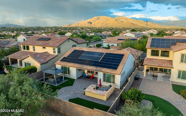 drone / aerial view with a mountain view and a residential view
