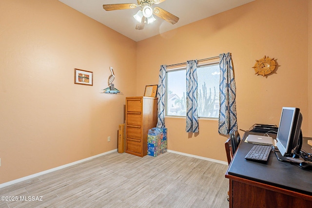 home office with ceiling fan and light wood-type flooring