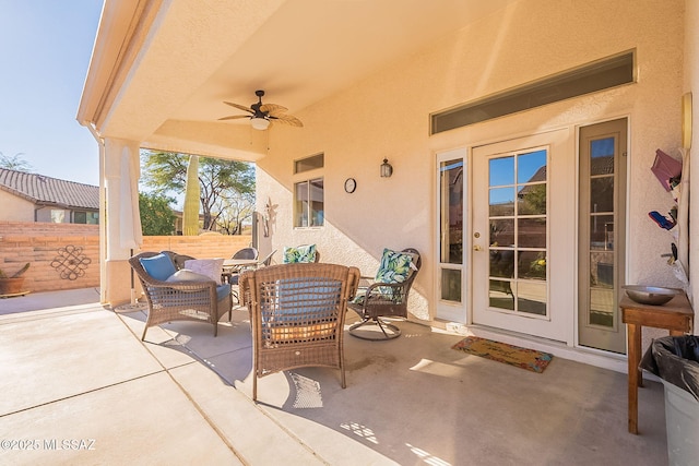 view of patio featuring ceiling fan