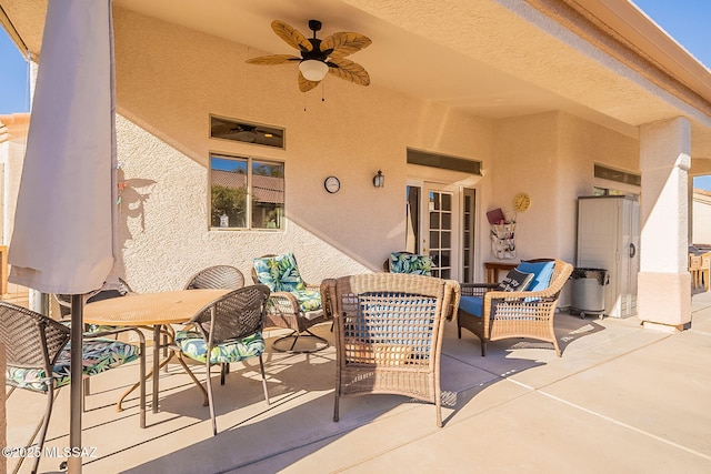 view of patio / terrace featuring ceiling fan