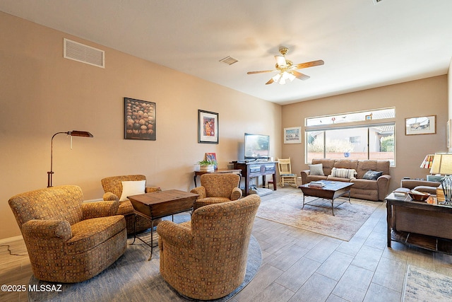 living room with ceiling fan