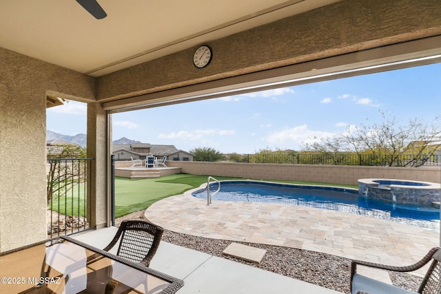 view of pool featuring an in ground hot tub and a patio area