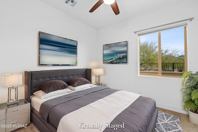 carpeted bedroom featuring ceiling fan