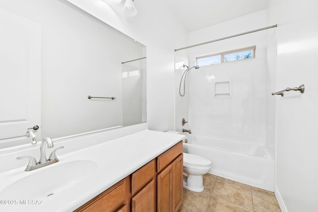 full bathroom with toilet, vanity, and washtub / shower combination