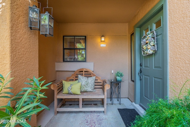 doorway to property with a porch