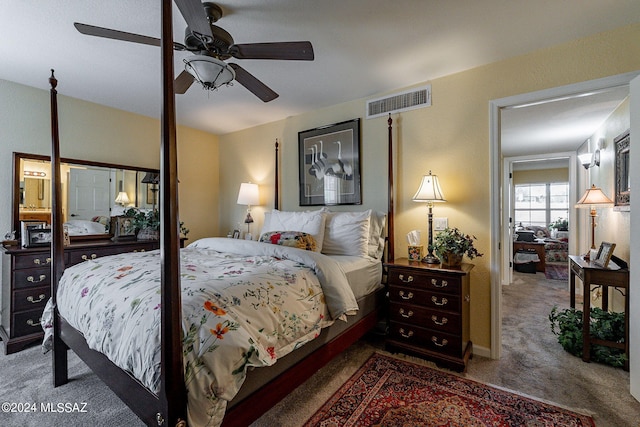 carpeted bedroom with ceiling fan