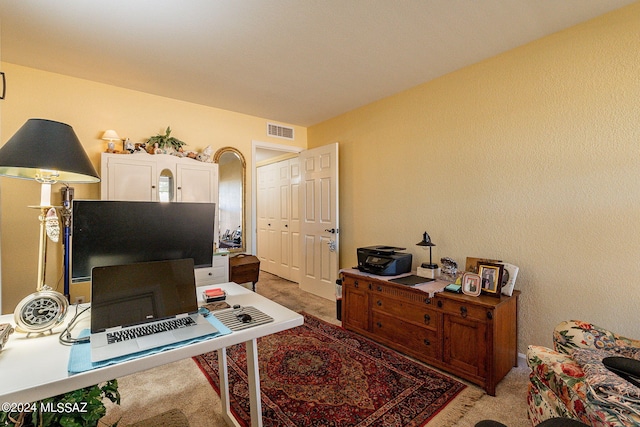 home office with light colored carpet