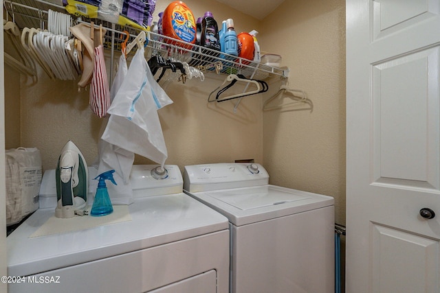 laundry room with independent washer and dryer