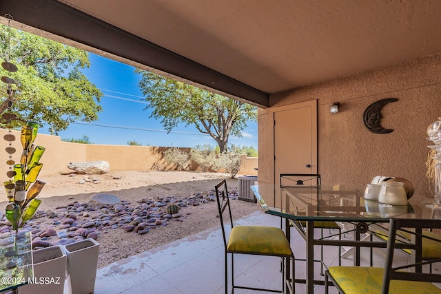 view of patio with central AC