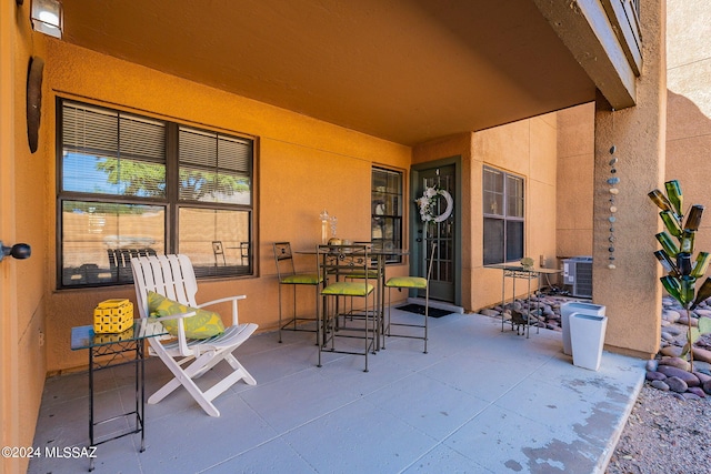 view of patio / terrace featuring cooling unit