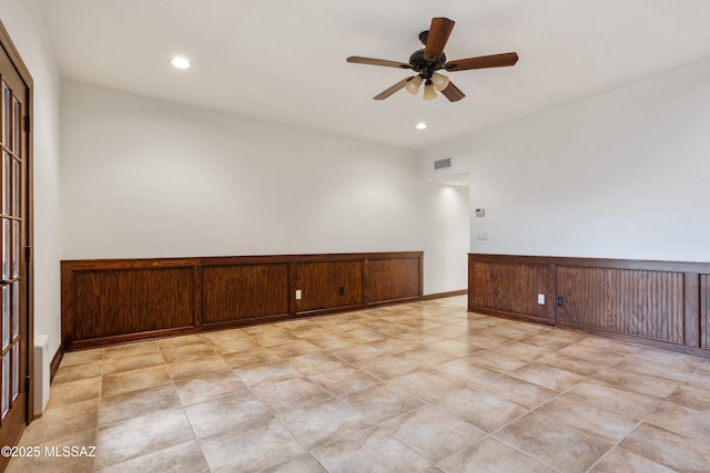 unfurnished room featuring ceiling fan