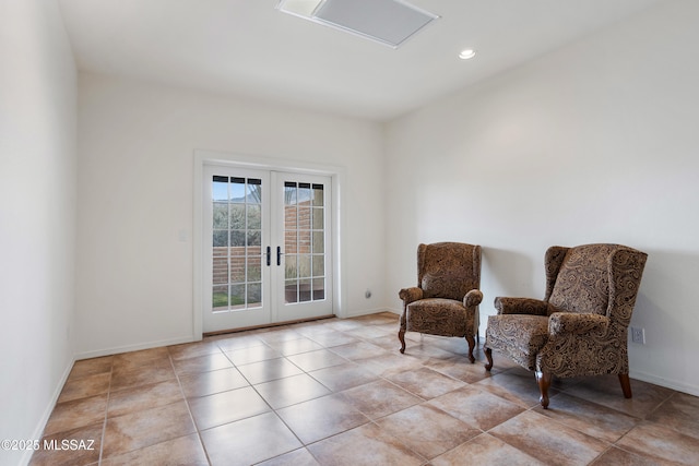 sitting room featuring french doors