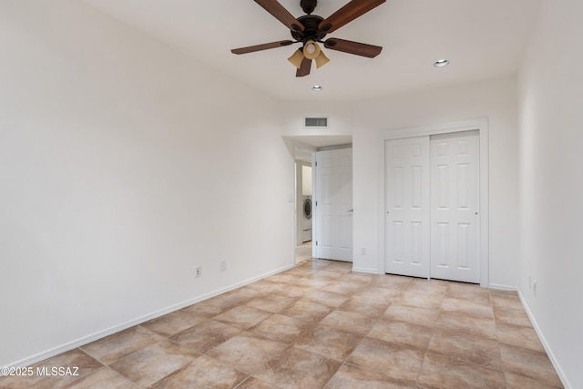 unfurnished bedroom featuring ceiling fan and a closet