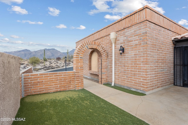 exterior space featuring a mountain view