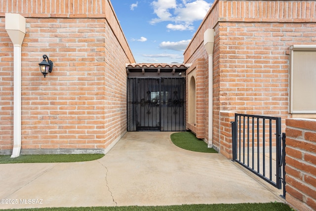 property entrance with a patio