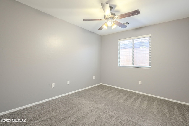 carpeted empty room with ceiling fan