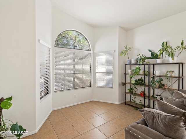 living area featuring light tile patterned floors