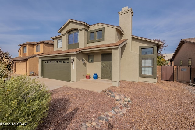 view of front facade featuring concrete driveway, a chimney, an attached garage, fence, and stucco siding