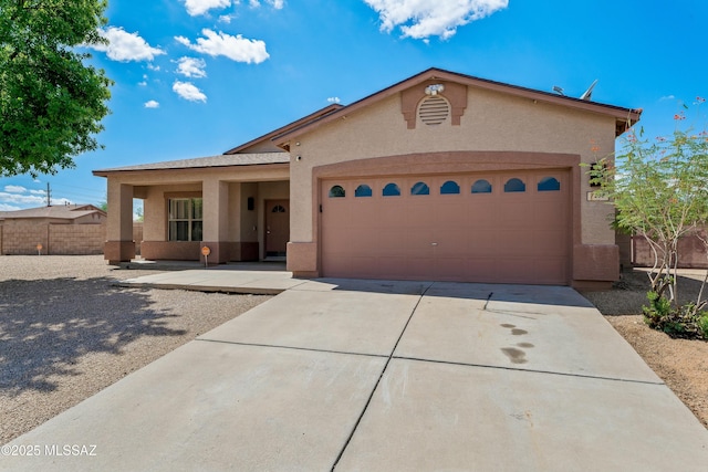 view of front of home with a garage