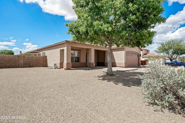 view of front of house with a garage