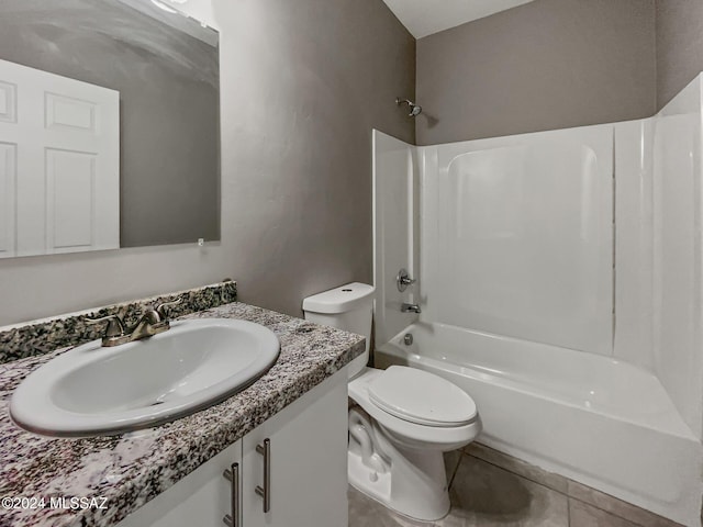 full bathroom featuring tile patterned floors, vanity, toilet, and shower / bathtub combination